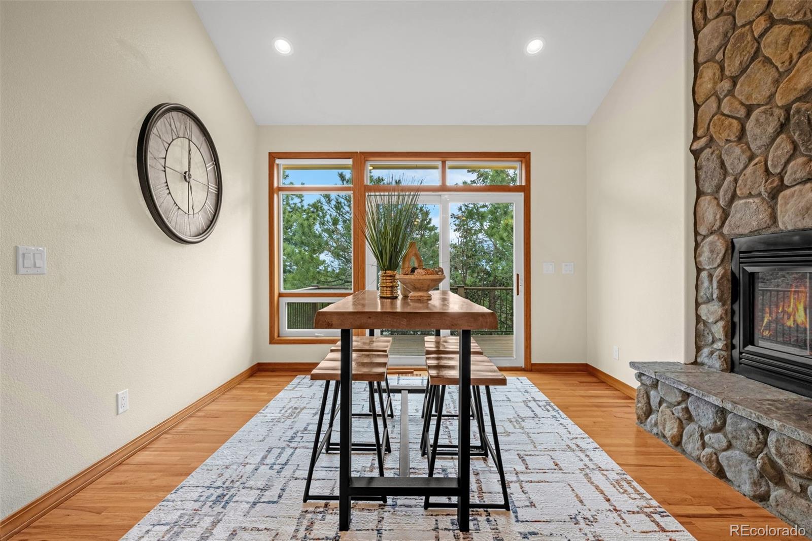25 Leaming Road Colorado Springs, CO 80906 - Photo 21 of 48 a view of a room with furniture wooden floor and a rug