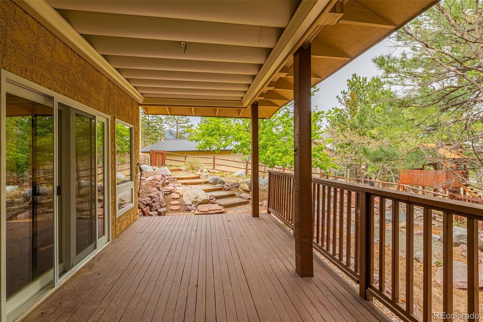 25 Leaming Road Colorado Springs, CO 80906 - Photo 37 of 48 a view of balcony with wooden floor