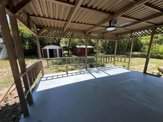 a house view with a garden space