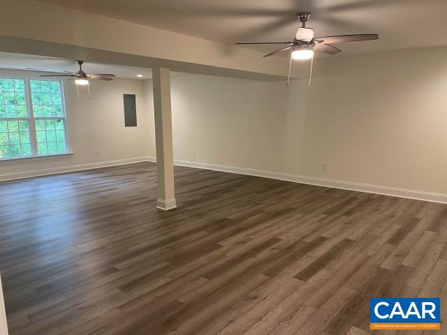 791 Westwood Road Stanardsville, VA 22973 - Photo 18 of 24 an empty room with wooden floor fan and windows