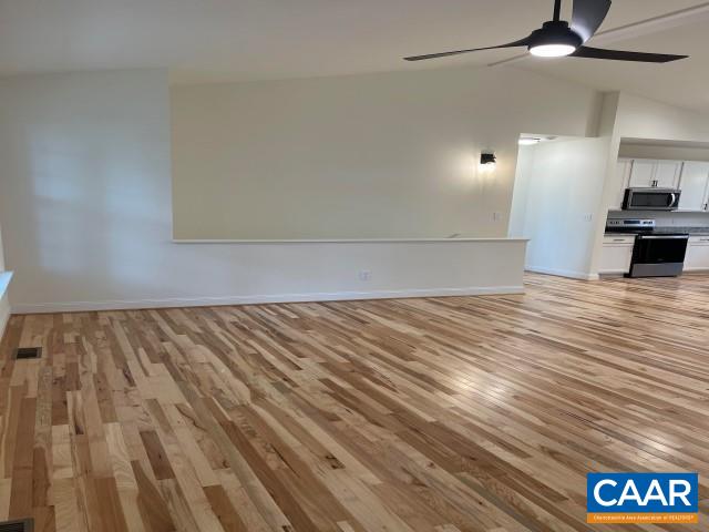 791 Westwood Road Stanardsville, VA 22973 - Photo 19 of 24 a view of empty room with wooden floor and fan