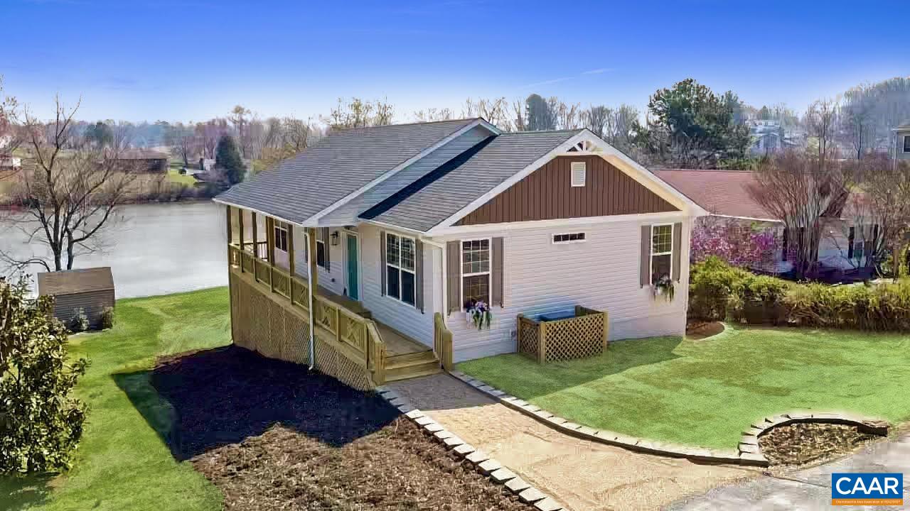 791 Westwood Road Stanardsville, VA 22973 - Photo 2 of 24 a front view of a house with a yard