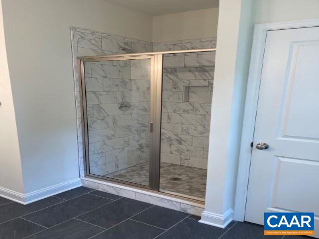 791 Westwood Road Stanardsville, VA 22973 - Photo 8 of 24 a bathroom with a glass shower door