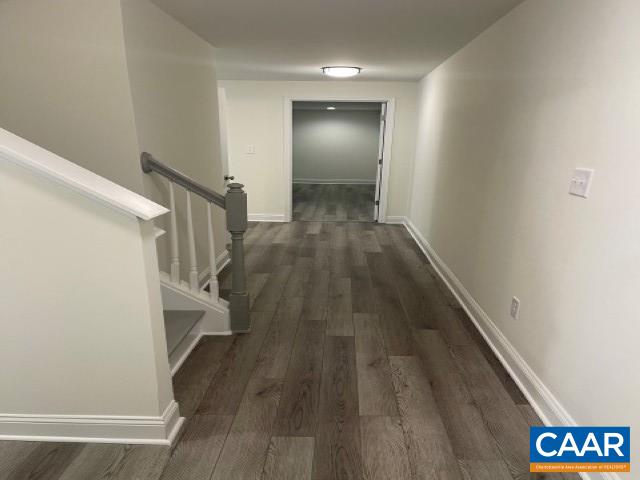 791 Westwood Road Stanardsville, VA 22973 - Photo 9 of 24 a view of hallway with stairs and wooden floor