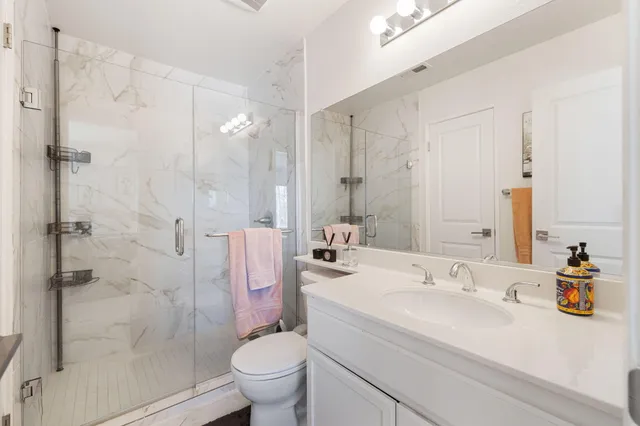 a view of a city with lawn chairs