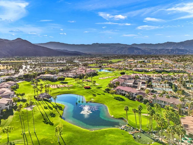 a view of living room with furniture and a window