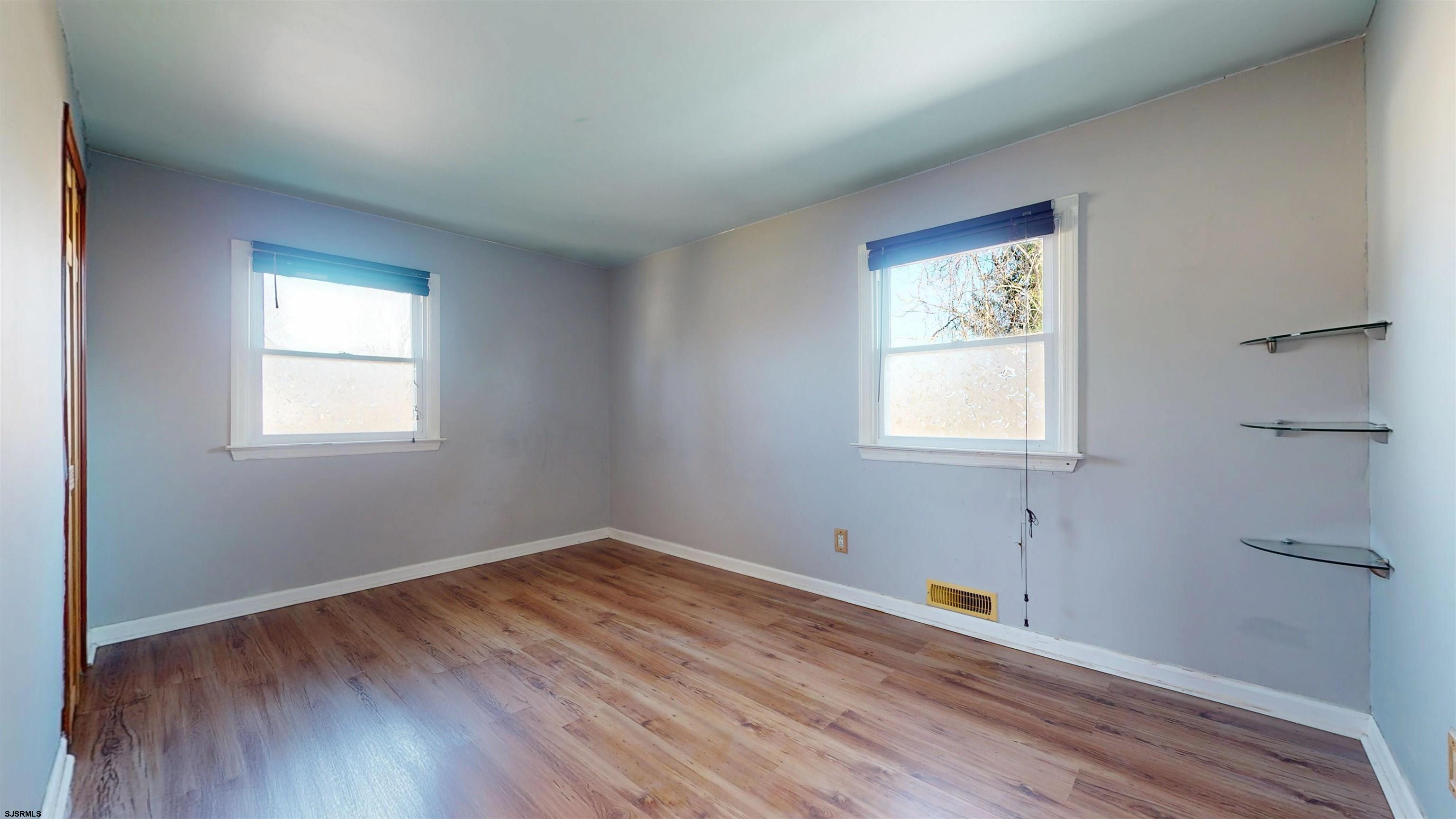 123 Devon Road Somers Point, NJ 08244 - Photo 15 of 41 a room with window and wooden floor
