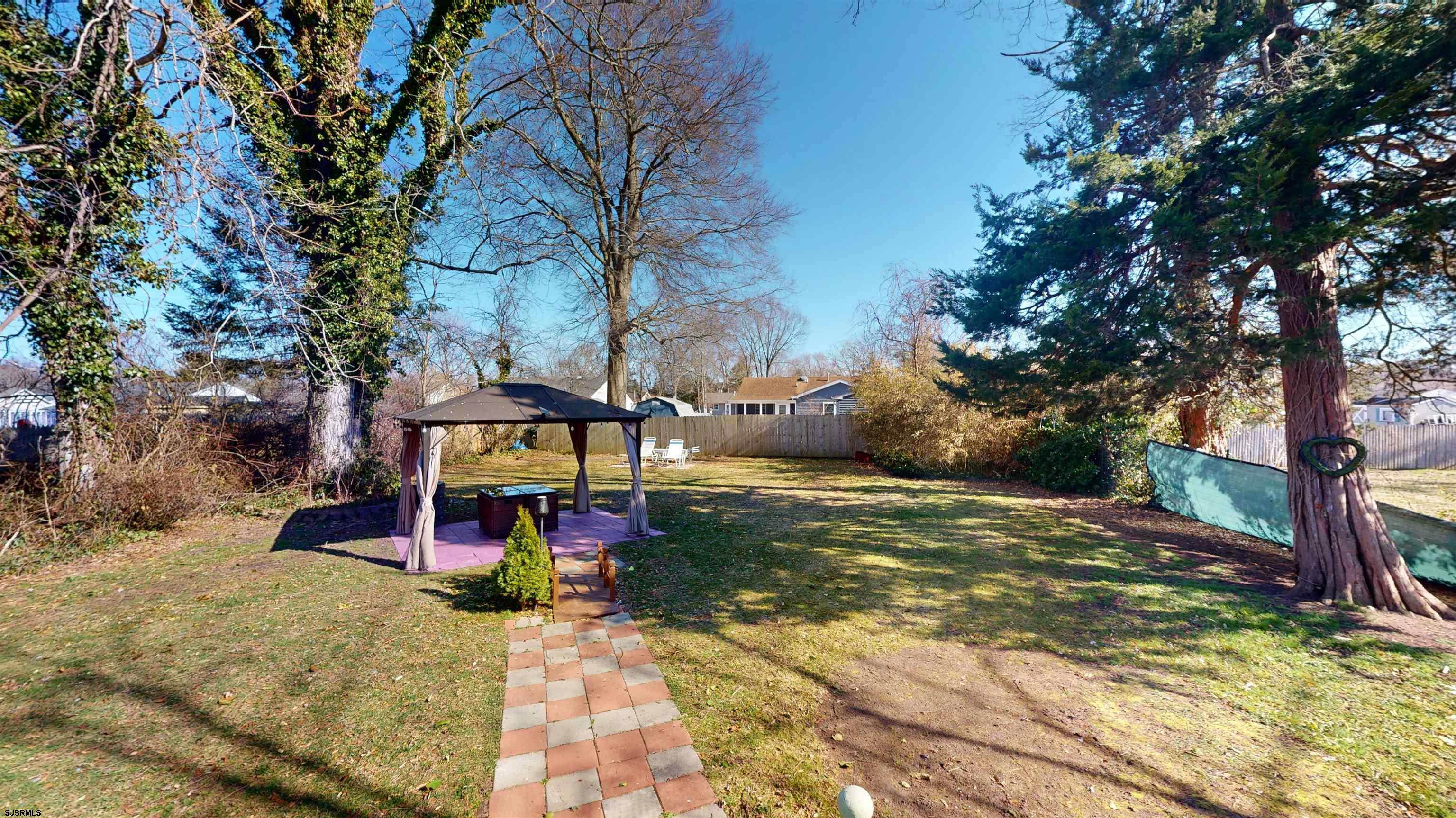 123 Devon Road Somers Point, NJ 08244 - Photo 34 of 41 a view of outdoor space with trees