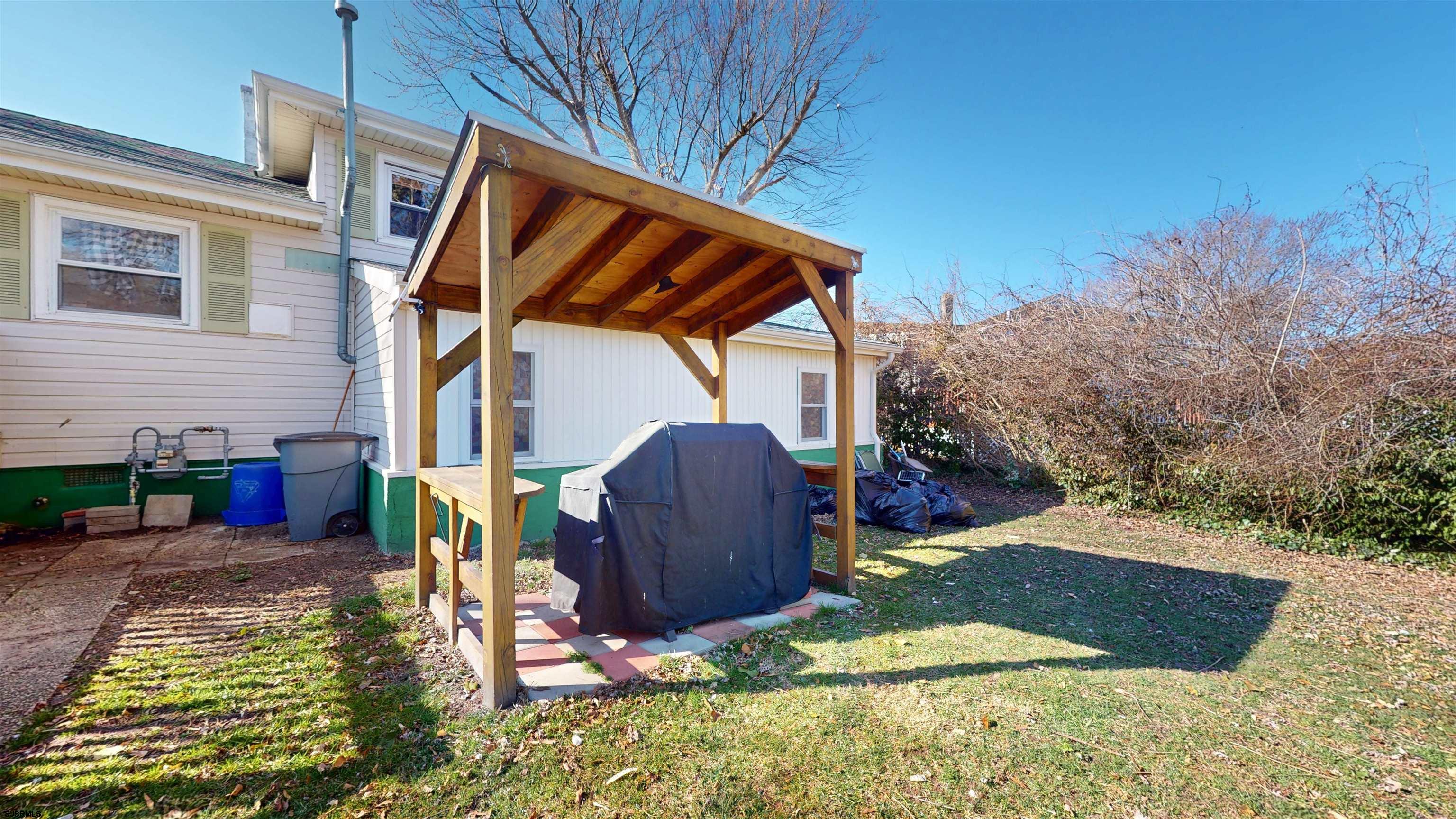 123 Devon Road Somers Point, NJ 08244 - Photo 38 of 41 a view of outdoor space yard deck patio and swimming pool