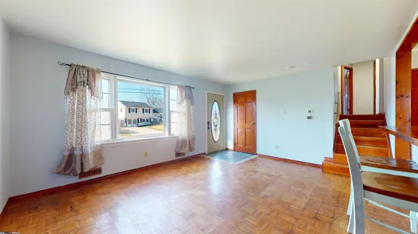 an empty room with windows