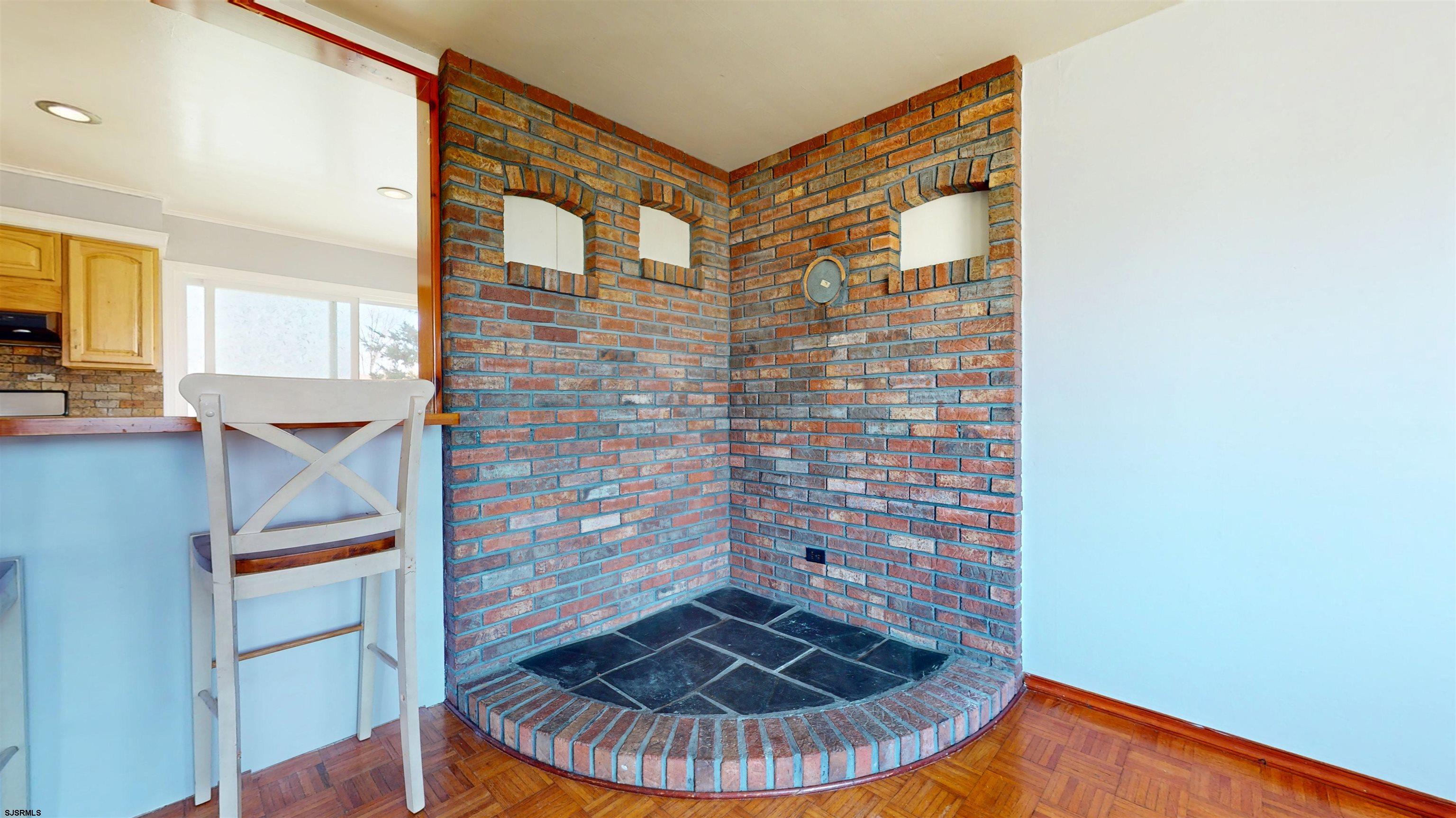 123 Devon Road Somers Point, NJ 08244 - Photo 9 of 41 a view of a fireplace in a room