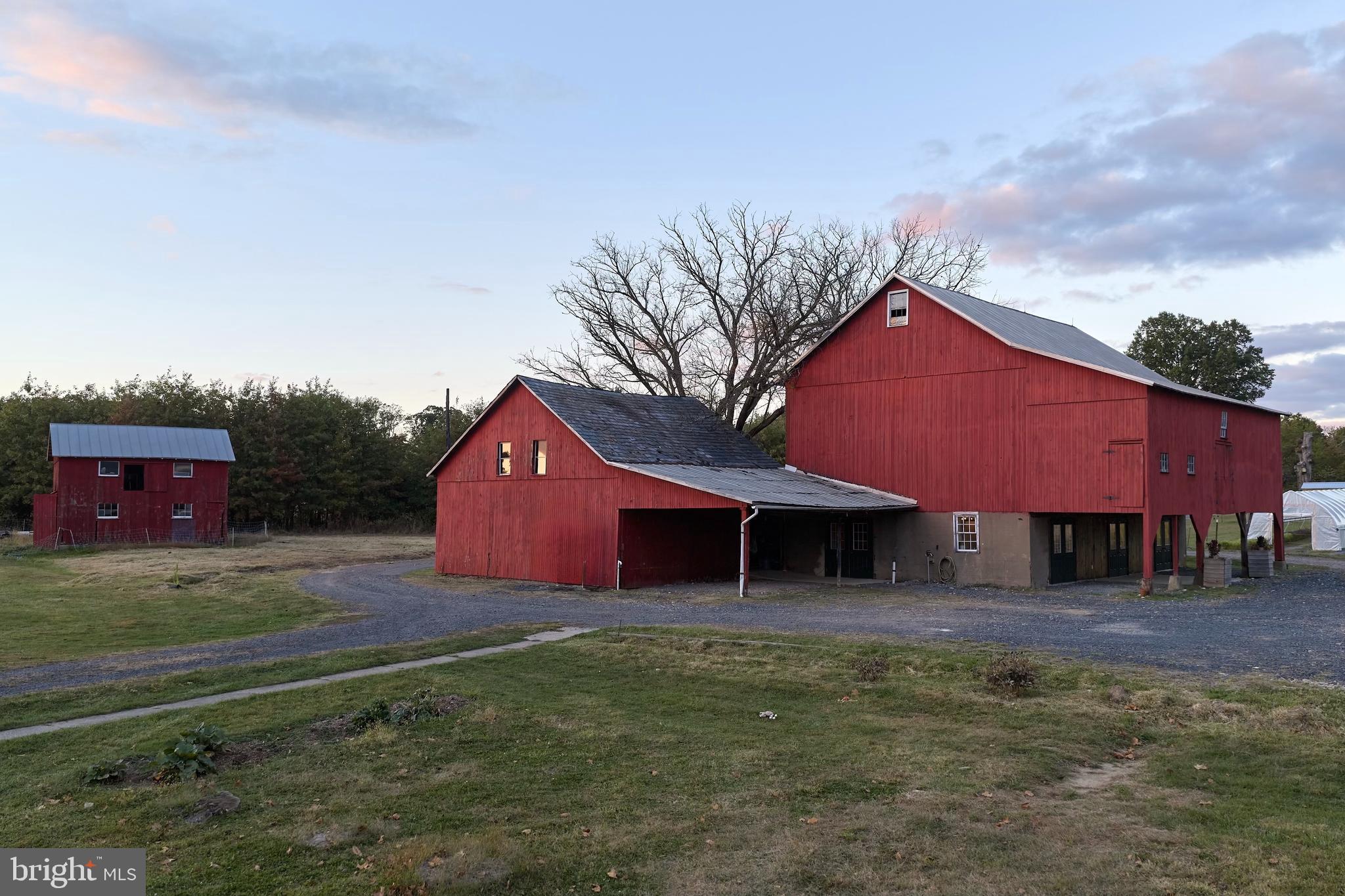 641 Cafferty Road Ottsville, PA 18942 - Photo 22 of 45 a front view of a house with garden