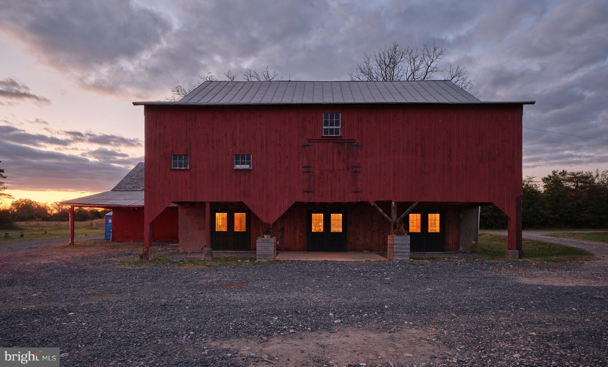 641 Cafferty Road Ottsville, PA 18942 - Photo 24 of 45 a front view of a house with large trees