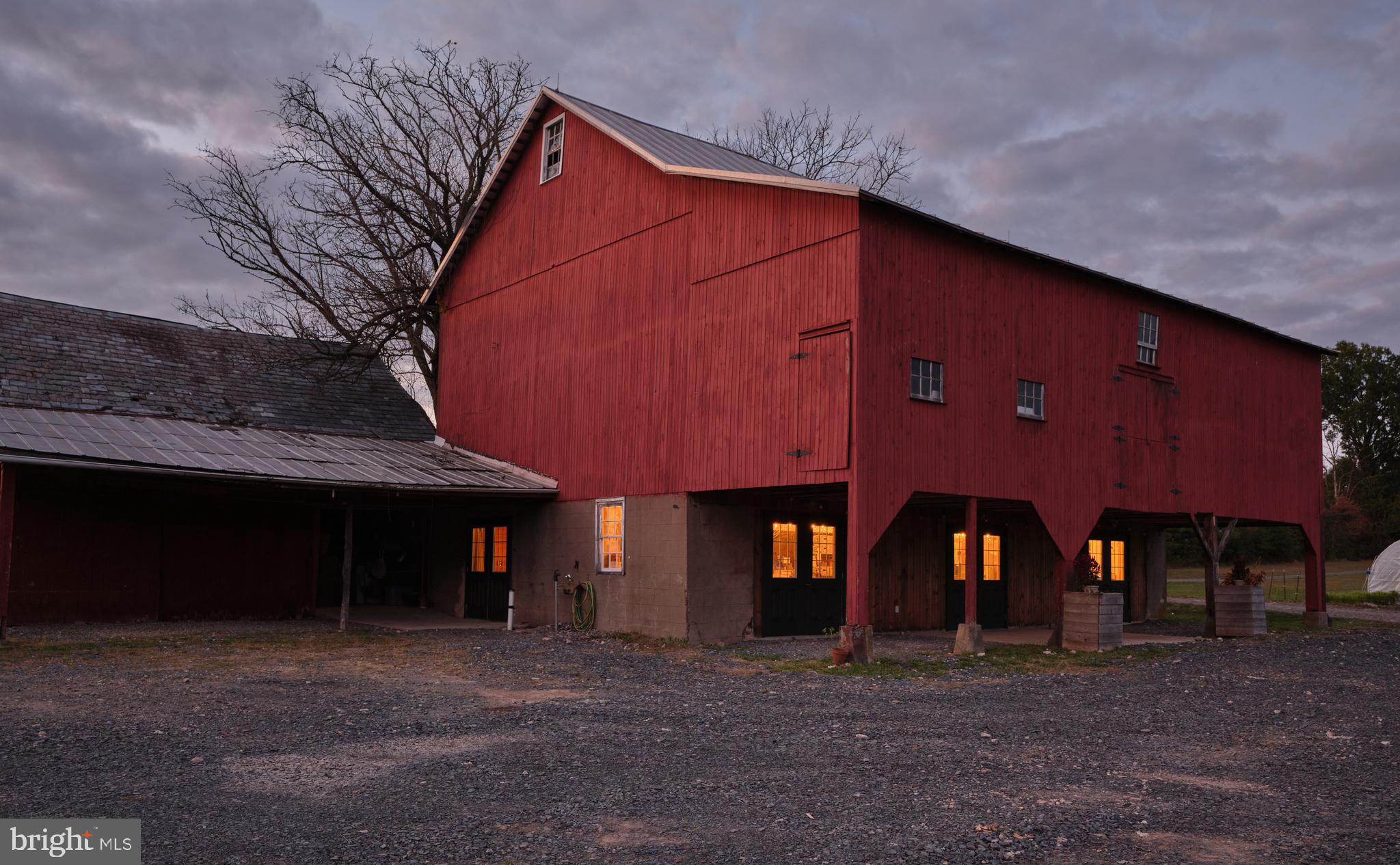 641 Cafferty Road Ottsville, PA 18942 - Photo 25 of 45 a front view of a house with large windows