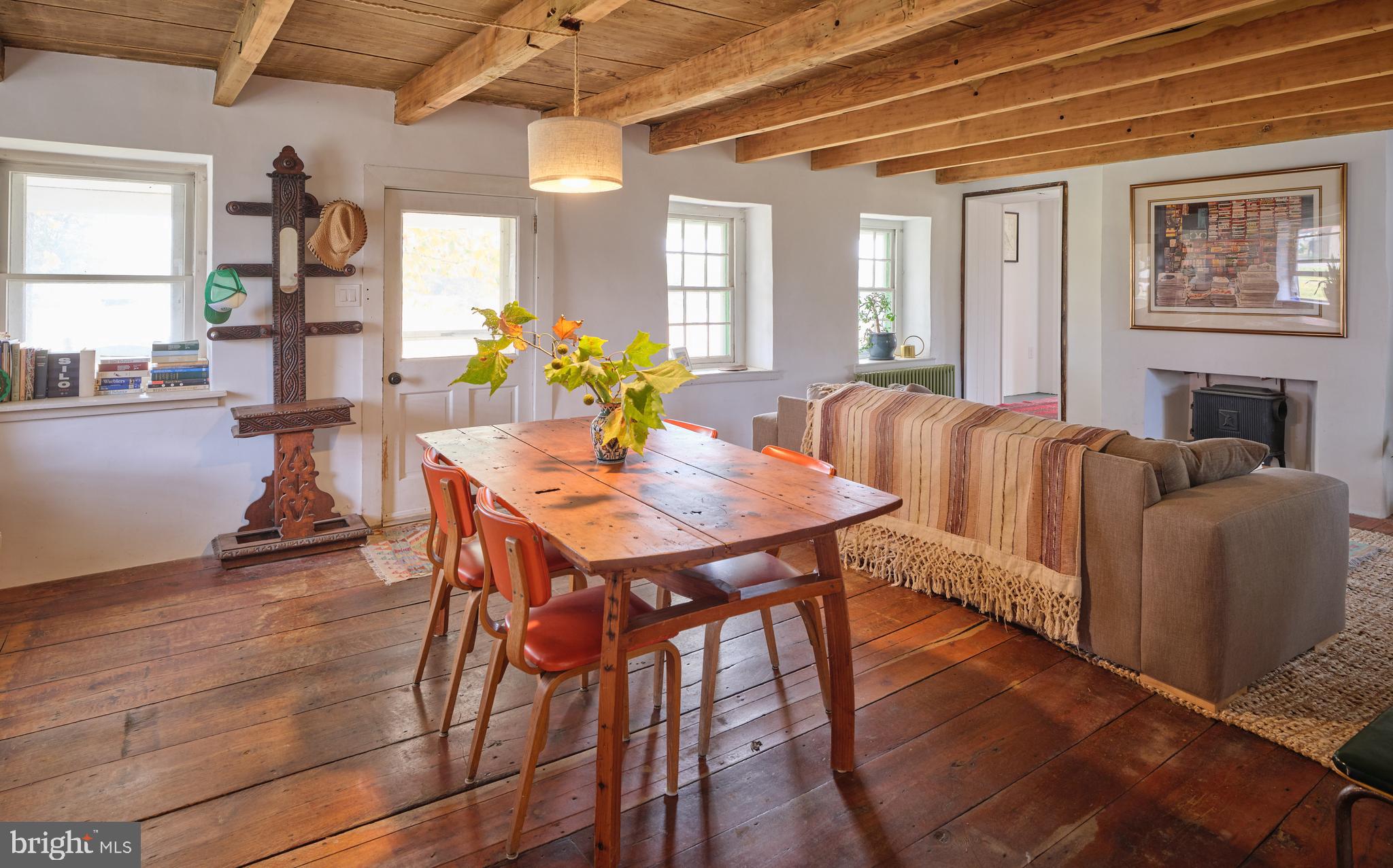 641 Cafferty Road Ottsville, PA 18942 - Photo 31 of 45 a view of a dining room with furniture and wooden floor