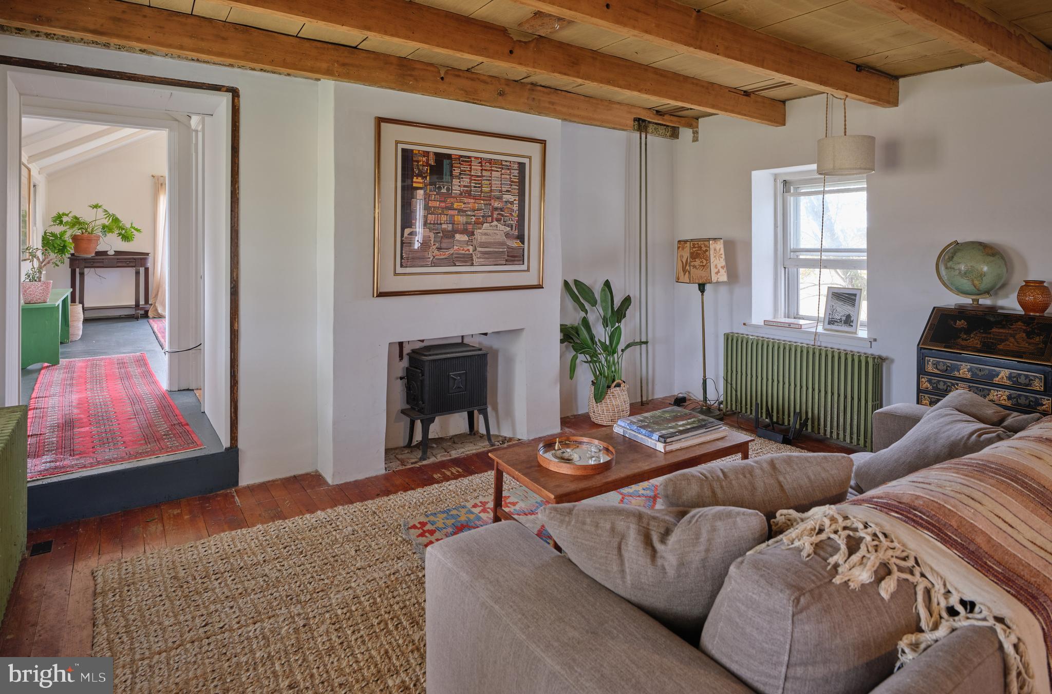 641 Cafferty Road Ottsville, PA 18942 - Photo 33 of 45 a living room with furniture and a fireplace