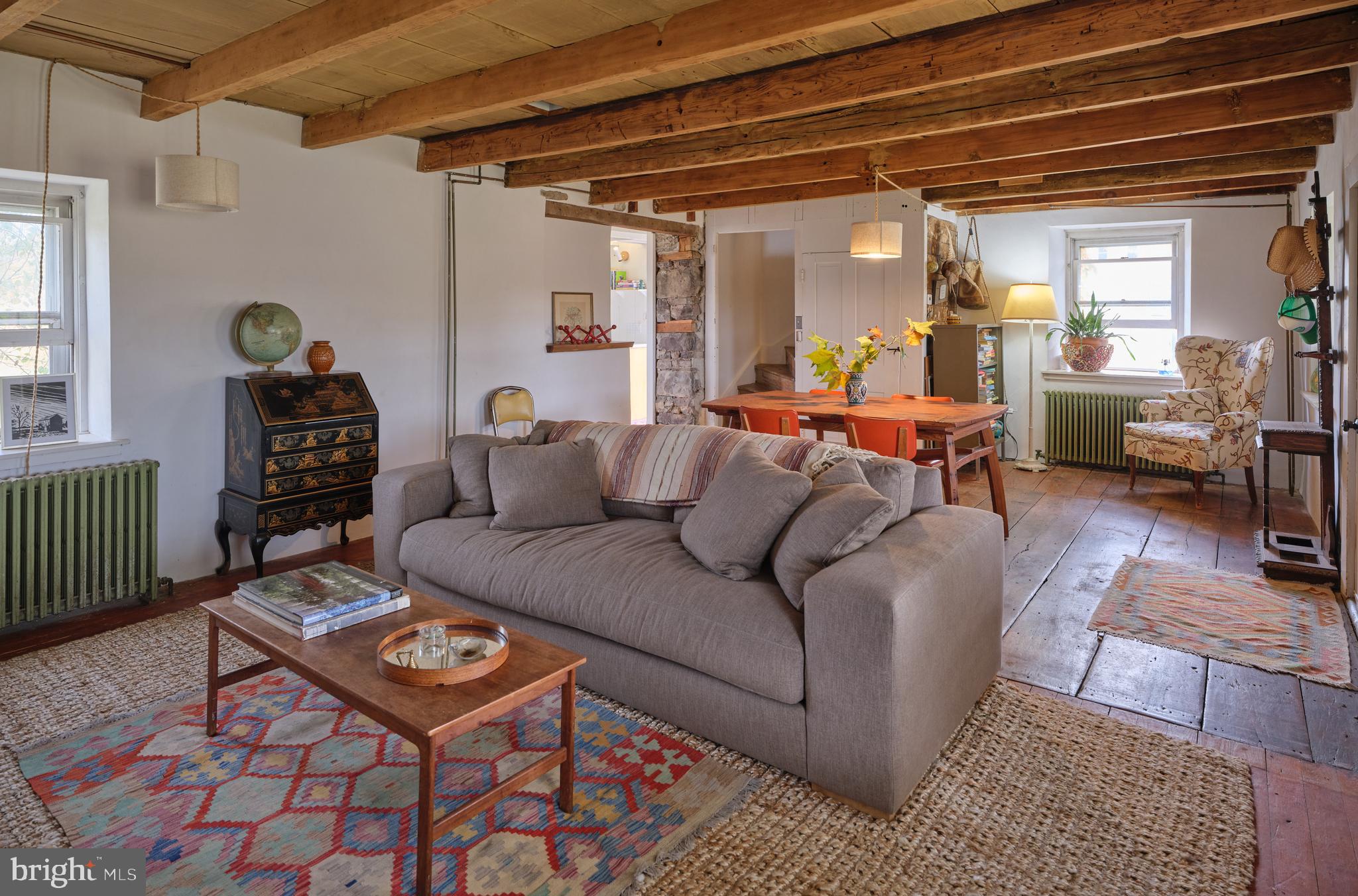 641 Cafferty Road Ottsville, PA 18942 - Photo 34 of 45 a living room with furniture and a wooden floor