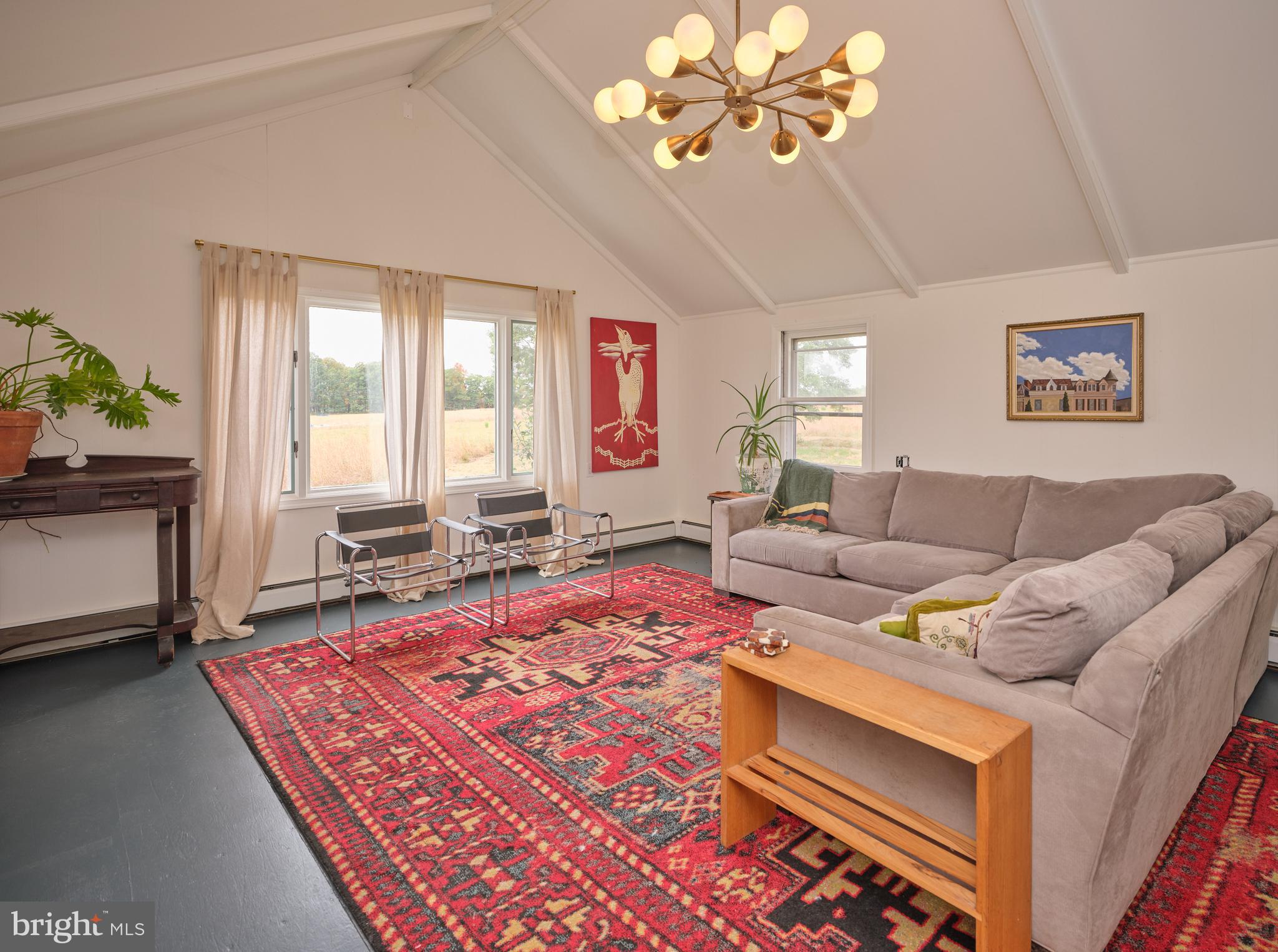 641 Cafferty Road Ottsville, PA 18942 - Photo 35 of 45 a living room with furniture and a rug
