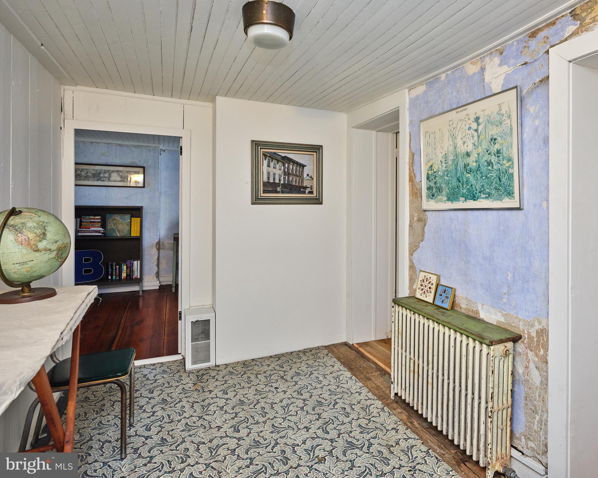 641 Cafferty Road Ottsville, PA 18942 - Photo 41 of 45 a view of a hallway to a livingroom with furniture