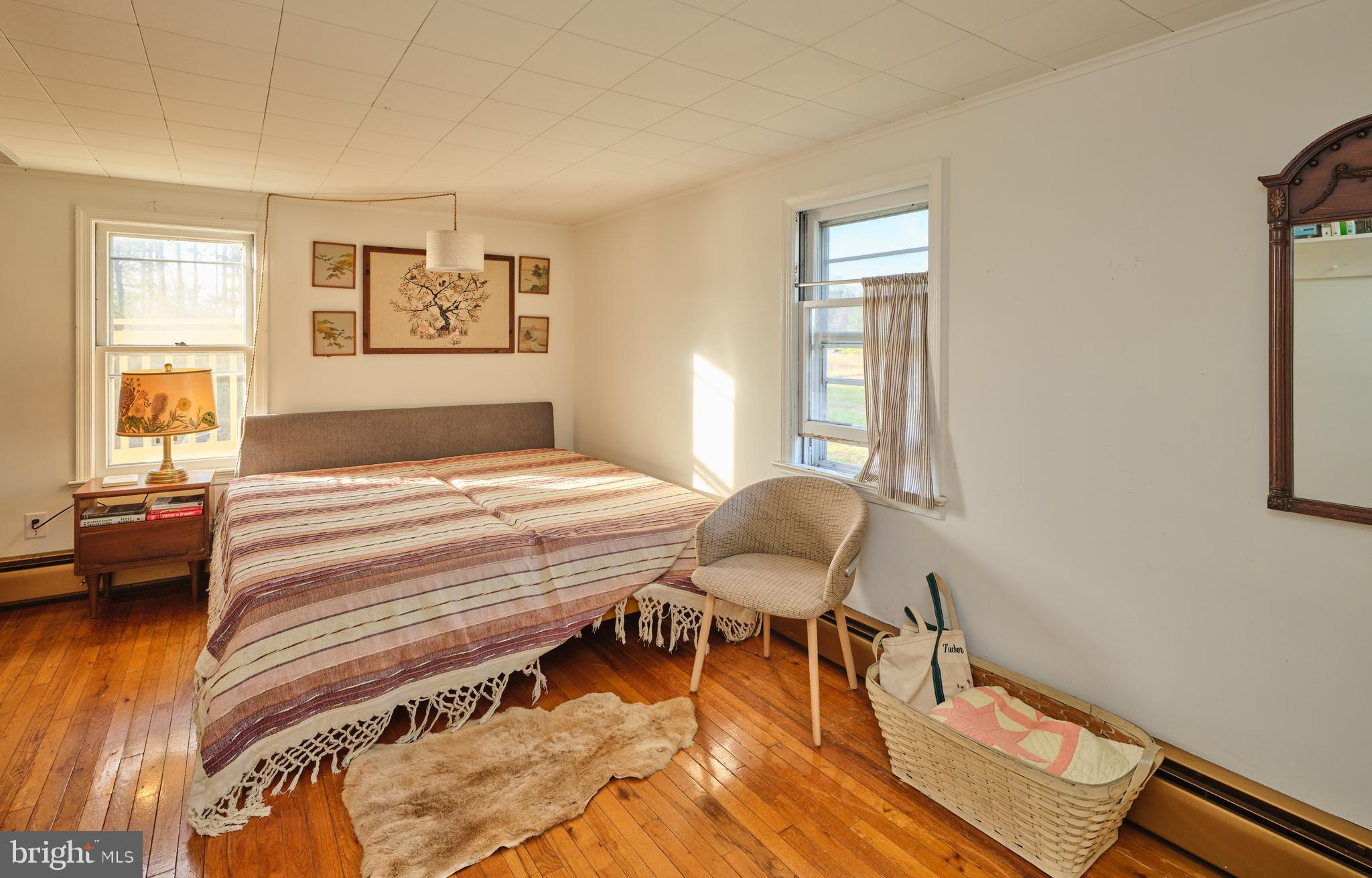 641 Cafferty Road Ottsville, PA 18942 - Photo 44 of 45 a bedroom with a bed and a window