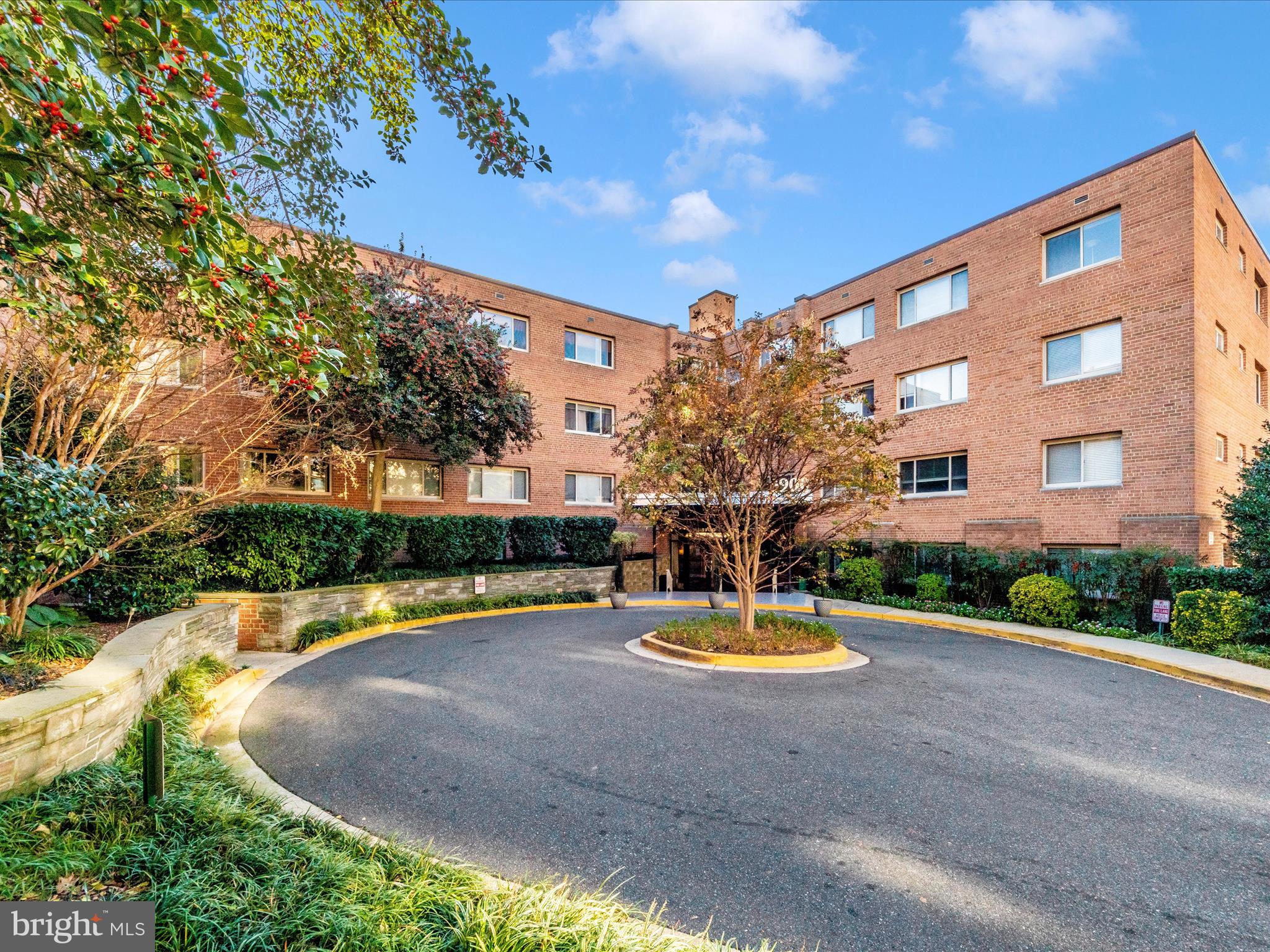 3900 Tunlaw Road Northwest, Unit 104 Washington, DC 20007 - Photo 2 of 36 a view of swimming pool with a yard