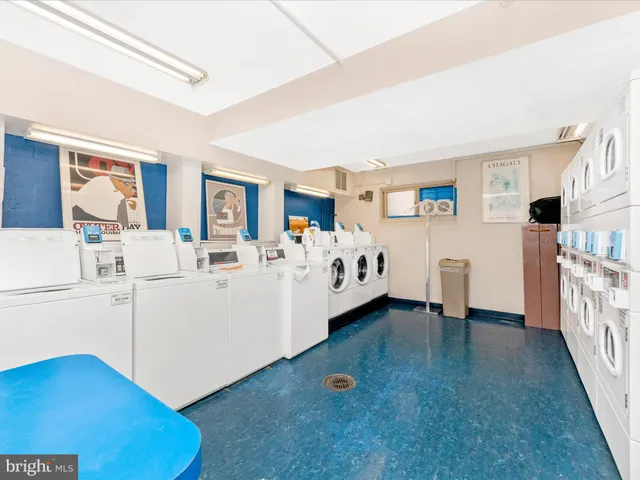 a view of living room with furniture and flat screen tv
