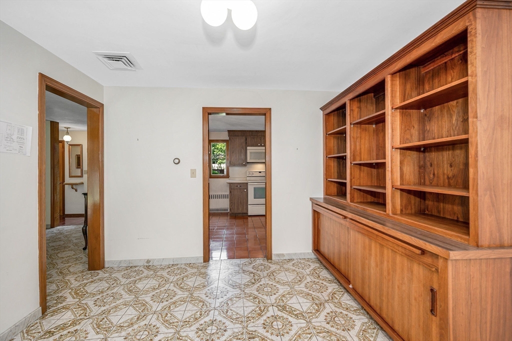 9 Seneca Drive Danvers, MA 01923 - Photo 11 of 41 a view of an empty room with a staircase