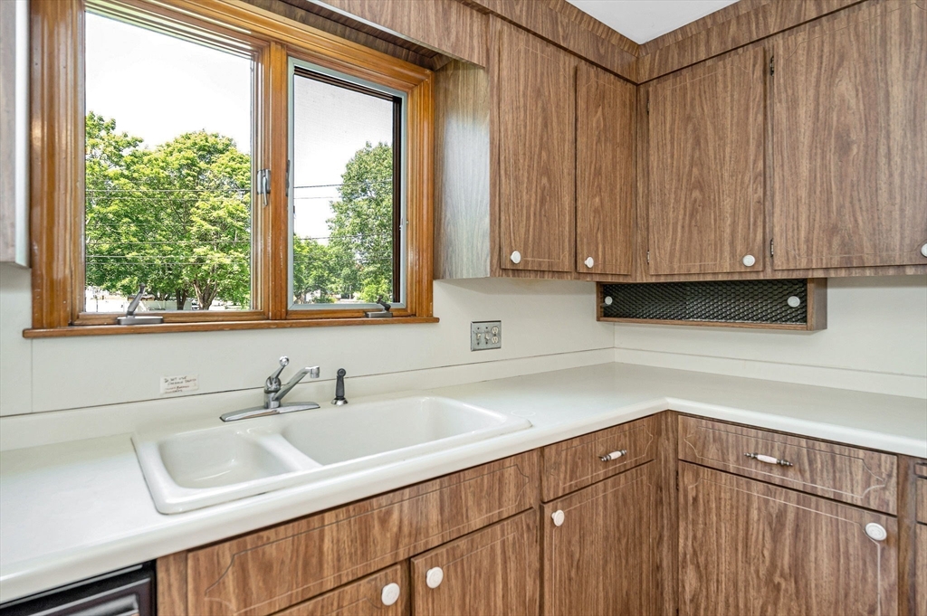 9 Seneca Drive Danvers, MA 01923 - Photo 13 of 41 a kitchen with a sink and a window