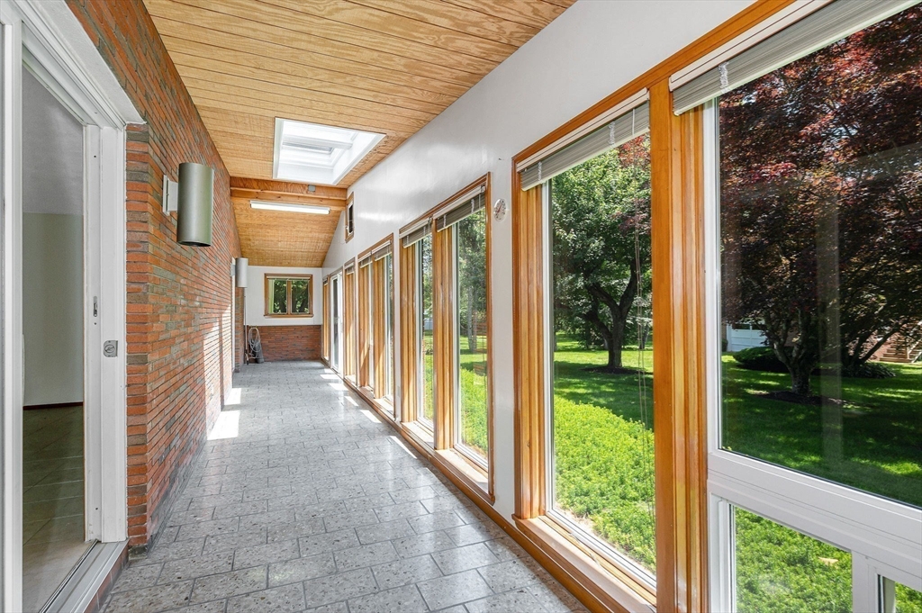 9 Seneca Drive Danvers, MA 01923 - Photo 18 of 41 a view of a porch with a yard