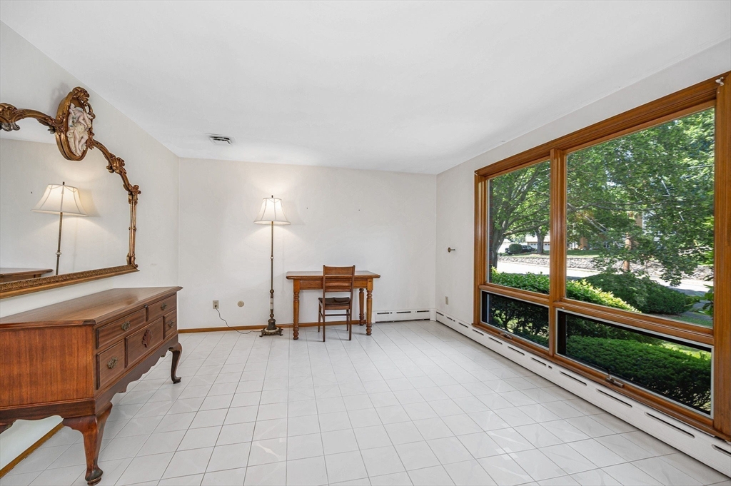 9 Seneca Drive Danvers, MA 01923 - Photo 23 of 41 a view of a room with gym equipment