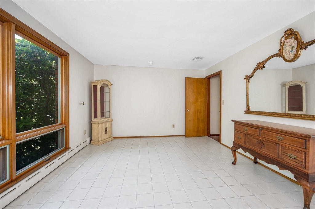 9 Seneca Drive Danvers, MA 01923 - Photo 25 of 41 a view of an empty room with a window
