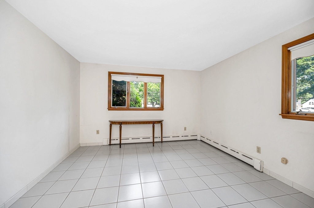 9 Seneca Drive Danvers, MA 01923 - Photo 26 of 41 a view of an empty room with a window