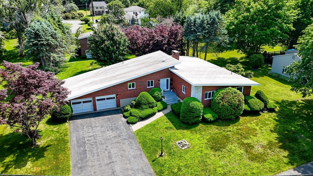9 Seneca Drive Danvers, MA 01923 - Photo 3 of 41 an aerial view of a house with garden space and street view