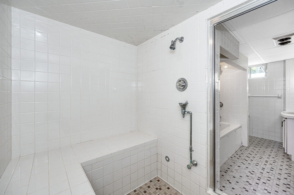 9 Seneca Drive Danvers, MA 01923 - Photo 34 of 41 a bathroom with a glass door shower