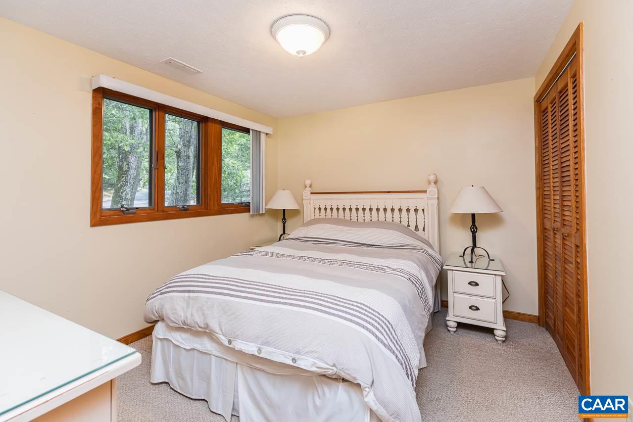 402 3 Ridges Roseland, VA 22967 - Photo 10 of 15 a bedroom with a bed and a window