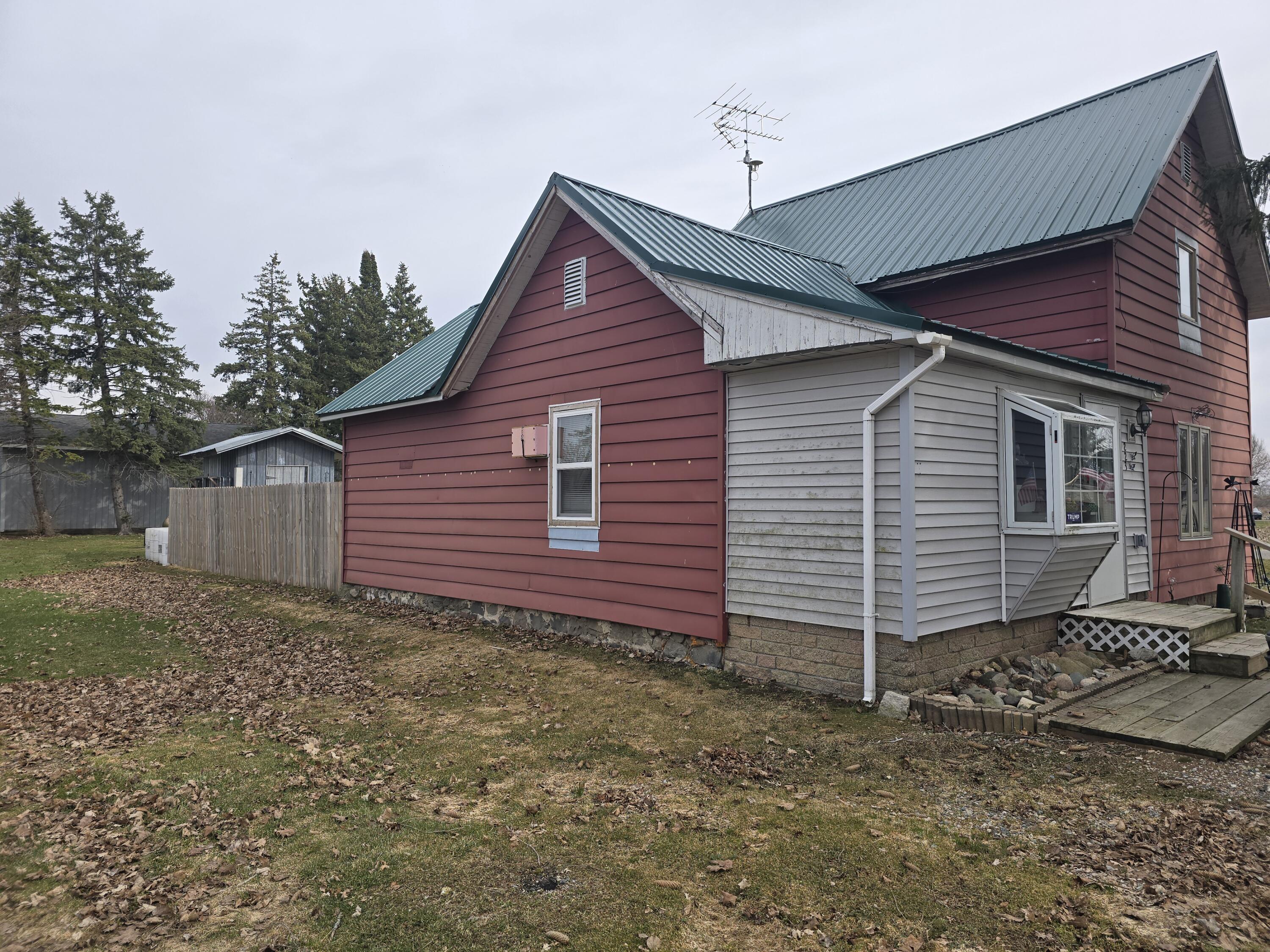 223 Howell Street South Middleton, MI 48856 - Photo 22 of 23 North side of house