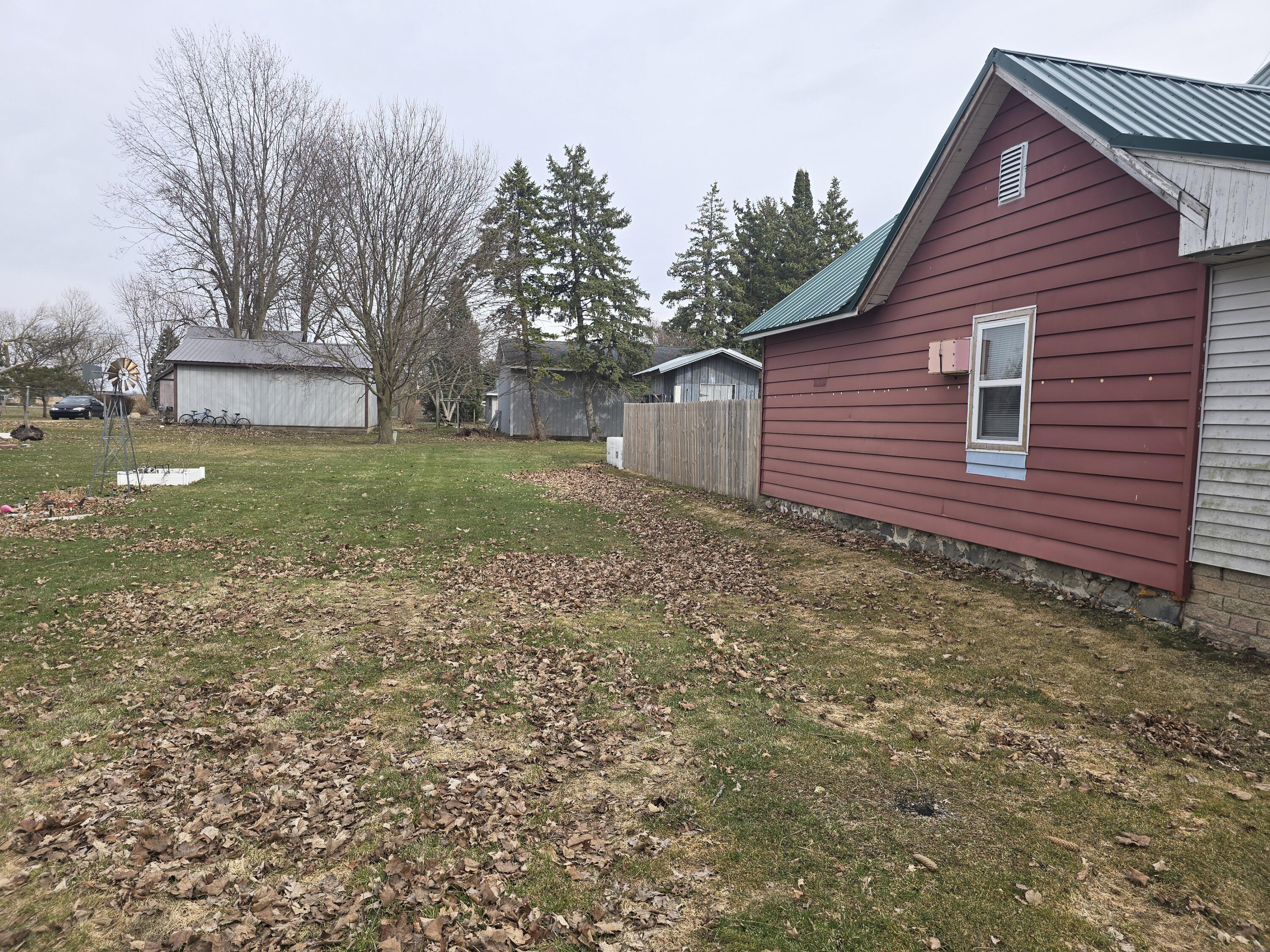 223 Howell Street South Middleton, MI 48856 - Photo 23 of 23 North side yard