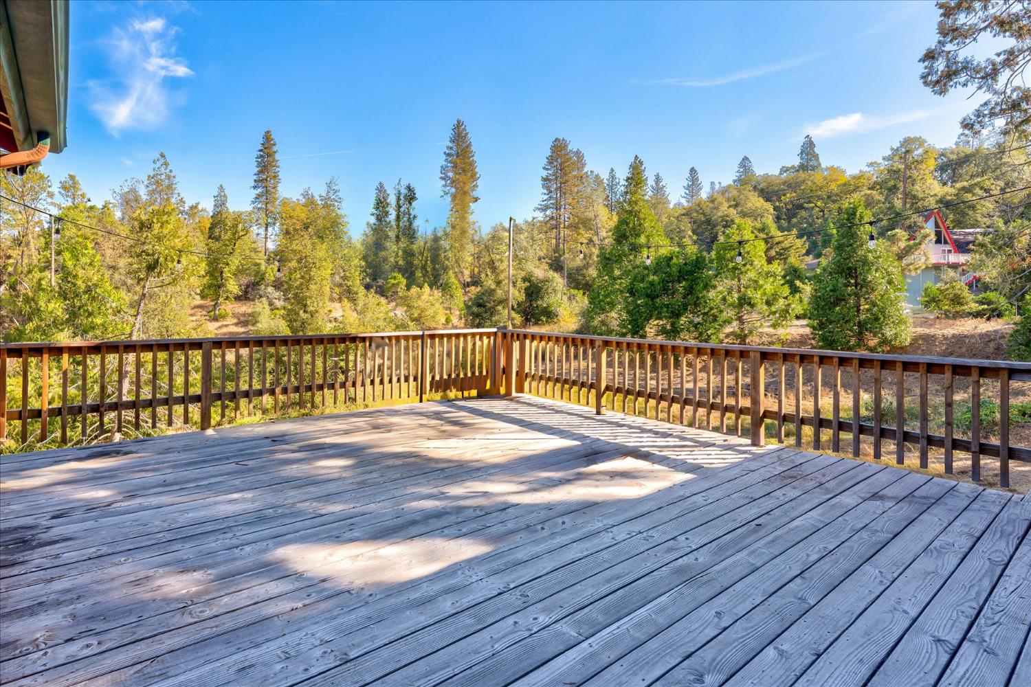 39712 Deer Ridge Drive Oakhurst, CA 93644 - Photo 15 of 40 a view of wooden floor with a lake view