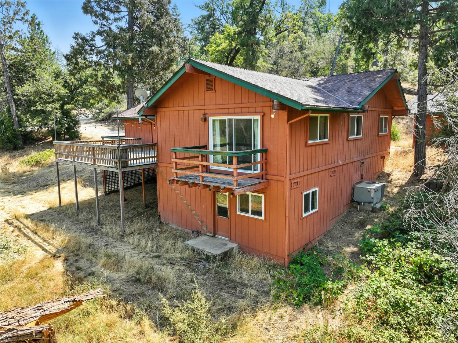 39712 Deer Ridge Drive Oakhurst, CA 93644 - Photo 36 of 40 a view of a house with backyard