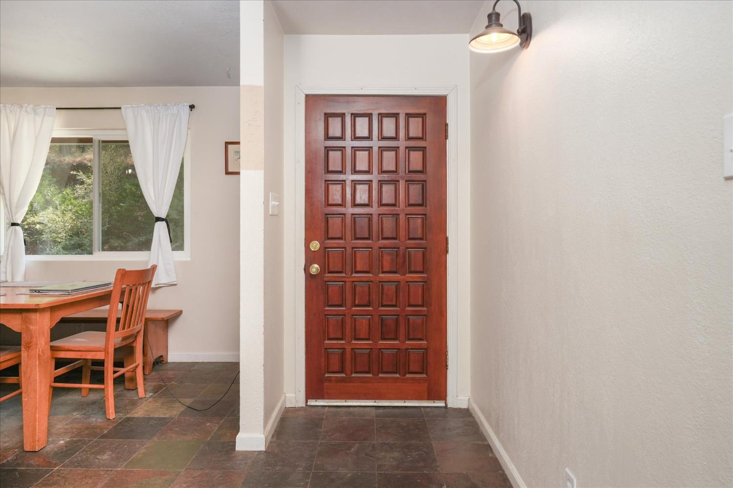 39712 Deer Ridge Drive Oakhurst, CA 93644 - Photo 4 of 40 a view of a hallway with seating area