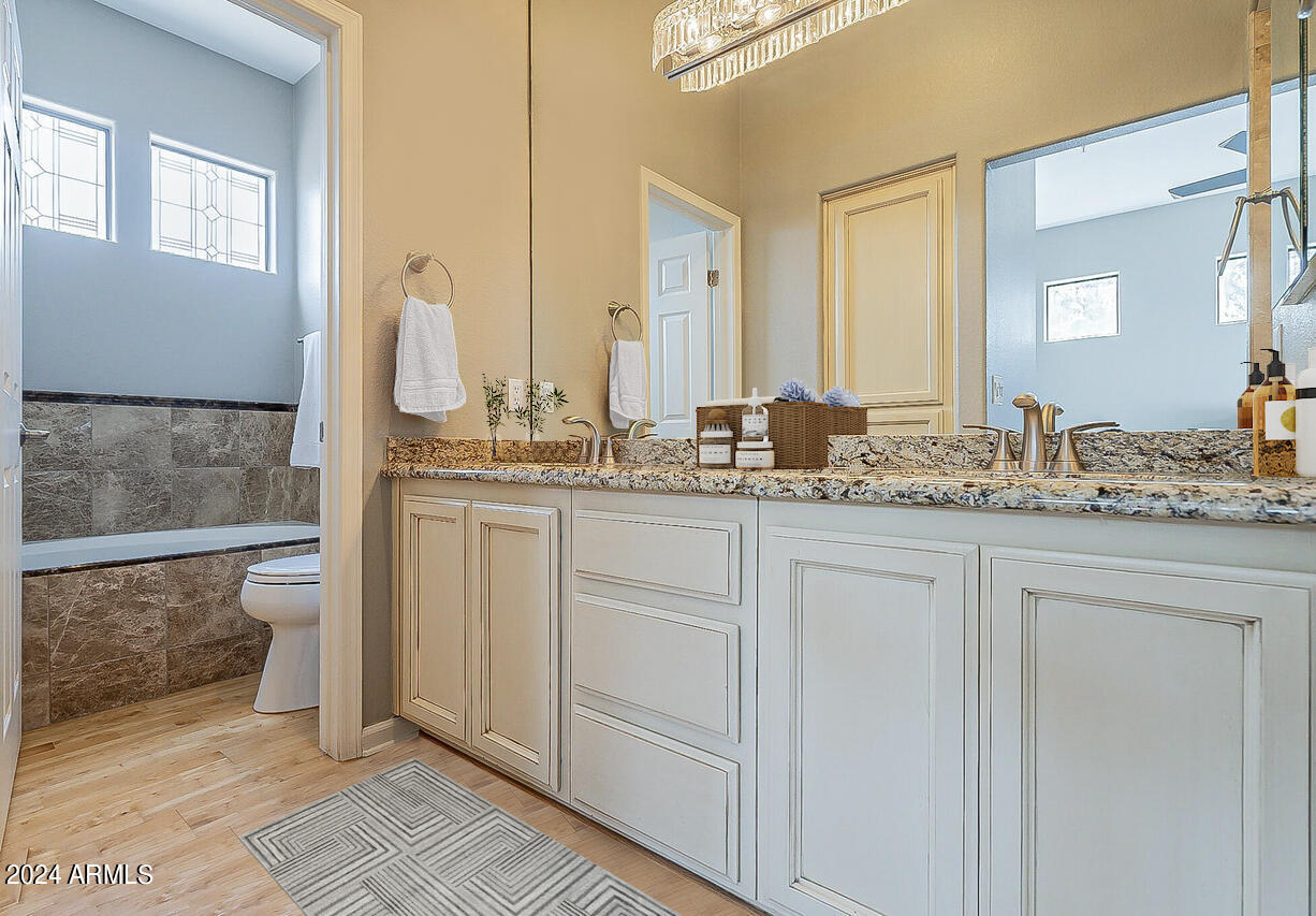 7222 East Gainey Ranch Road, Unit 202 Scottsdale, AZ 85258 - Photo 11 of 22 Oasis-202-Primary bathroom sinks tub