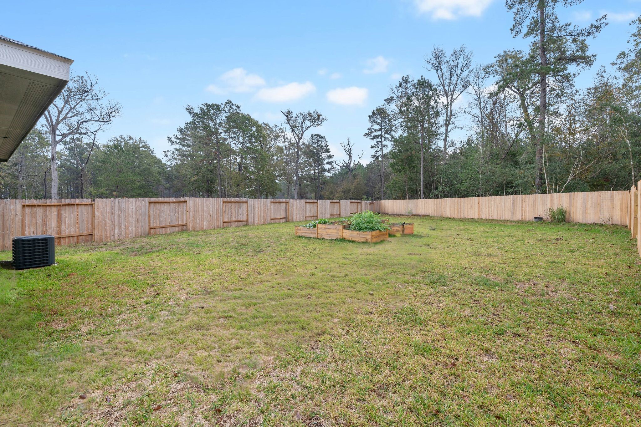12070 William Trails Circle Willis, TX 77378 - Photo 2 of 18 a view of an outdoor space and a yard