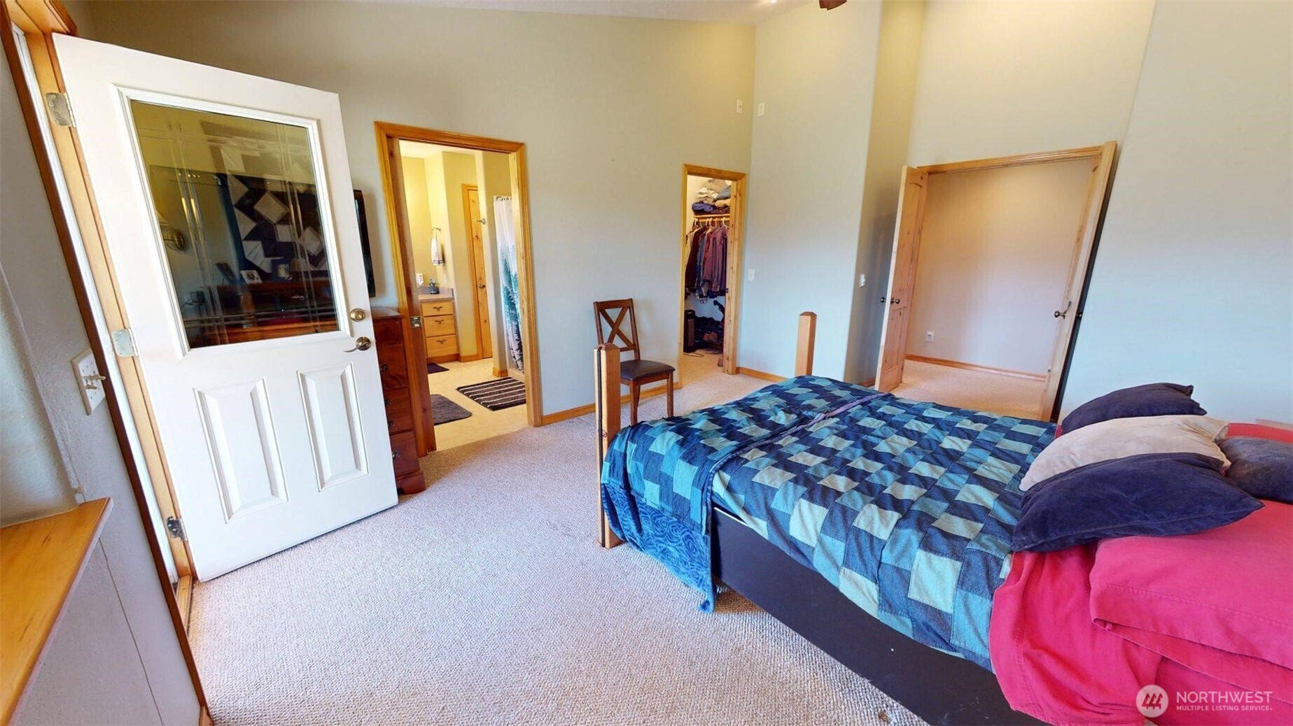 37 No. Name Road Tonasket, WA 98855 - Photo 11 of 33 a bedroom with a bed and a mirror