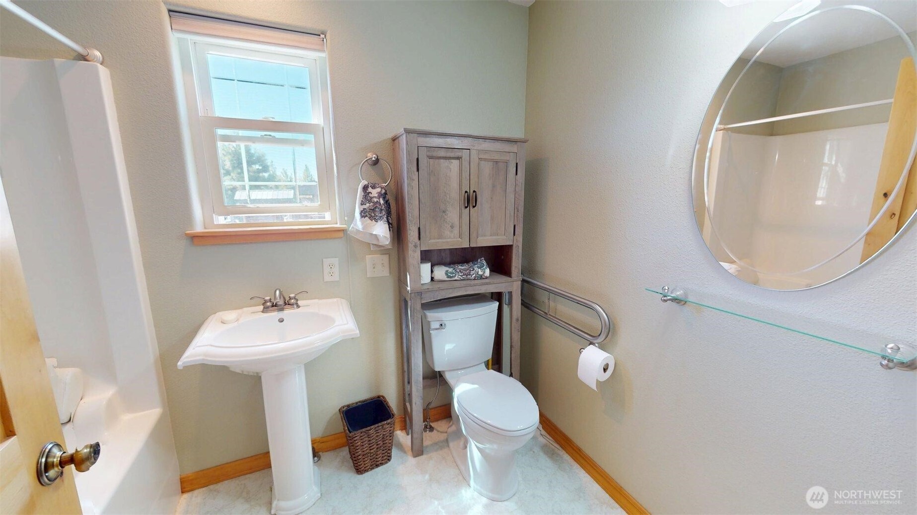 37 No. Name Road Tonasket, WA 98855 - Photo 13 of 33 a bathroom with a toilet sink and mirror
