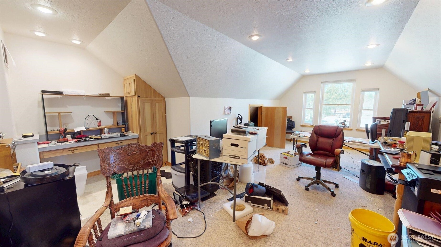 37 No. Name Road Tonasket, WA 98855 - Photo 16 of 33 a view of a workspace with furniture and a living room