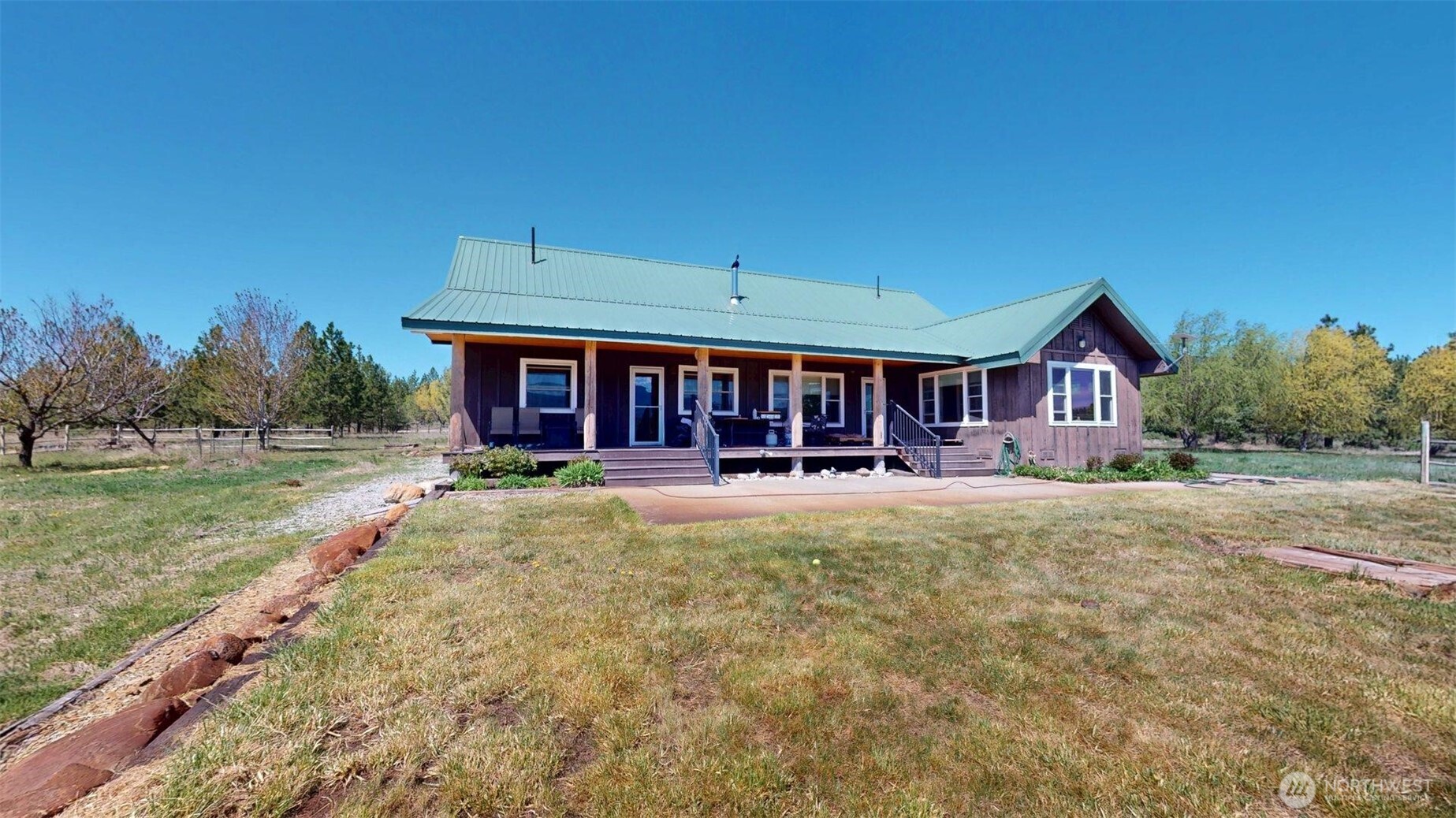 37 No. Name Road Tonasket, WA 98855 - Photo 31 of 33 a front view of a house with garden