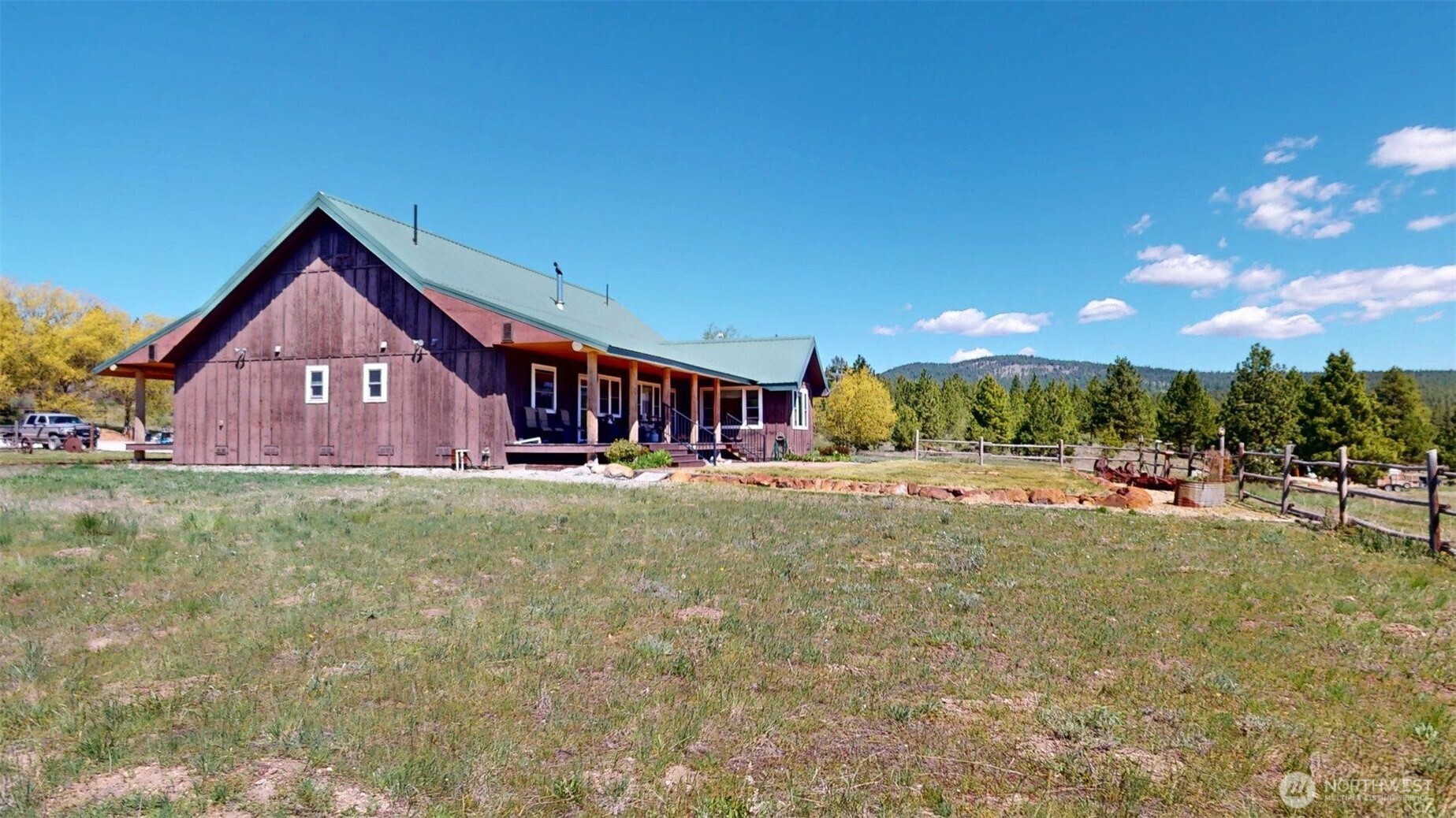 37 No. Name Road Tonasket, WA 98855 - Photo 33 of 33 a view of a house with a yard and sitting area