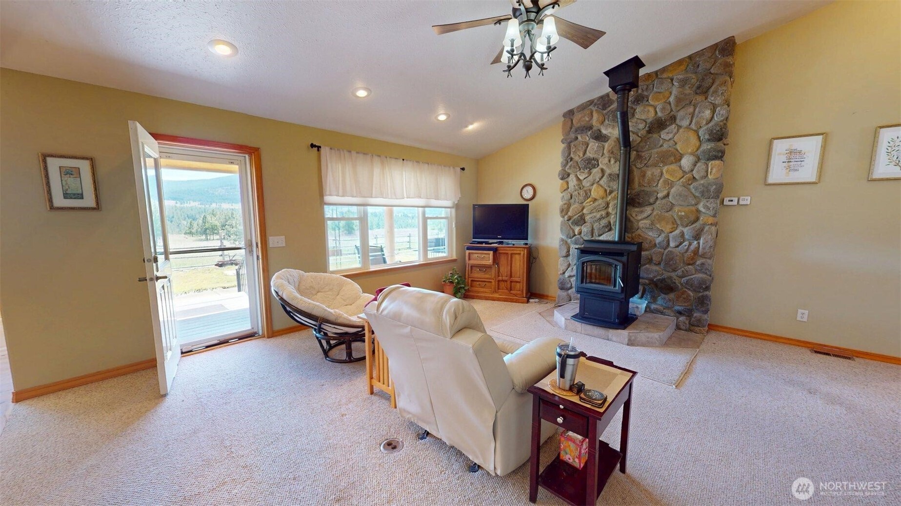 37 No. Name Road Tonasket, WA 98855 - Photo 8 of 33 a living room with furniture and a fireplace