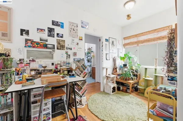 a view of a workspace with furniture and a livingroom