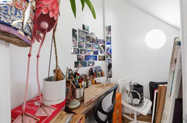 a view of a workspace with furniture